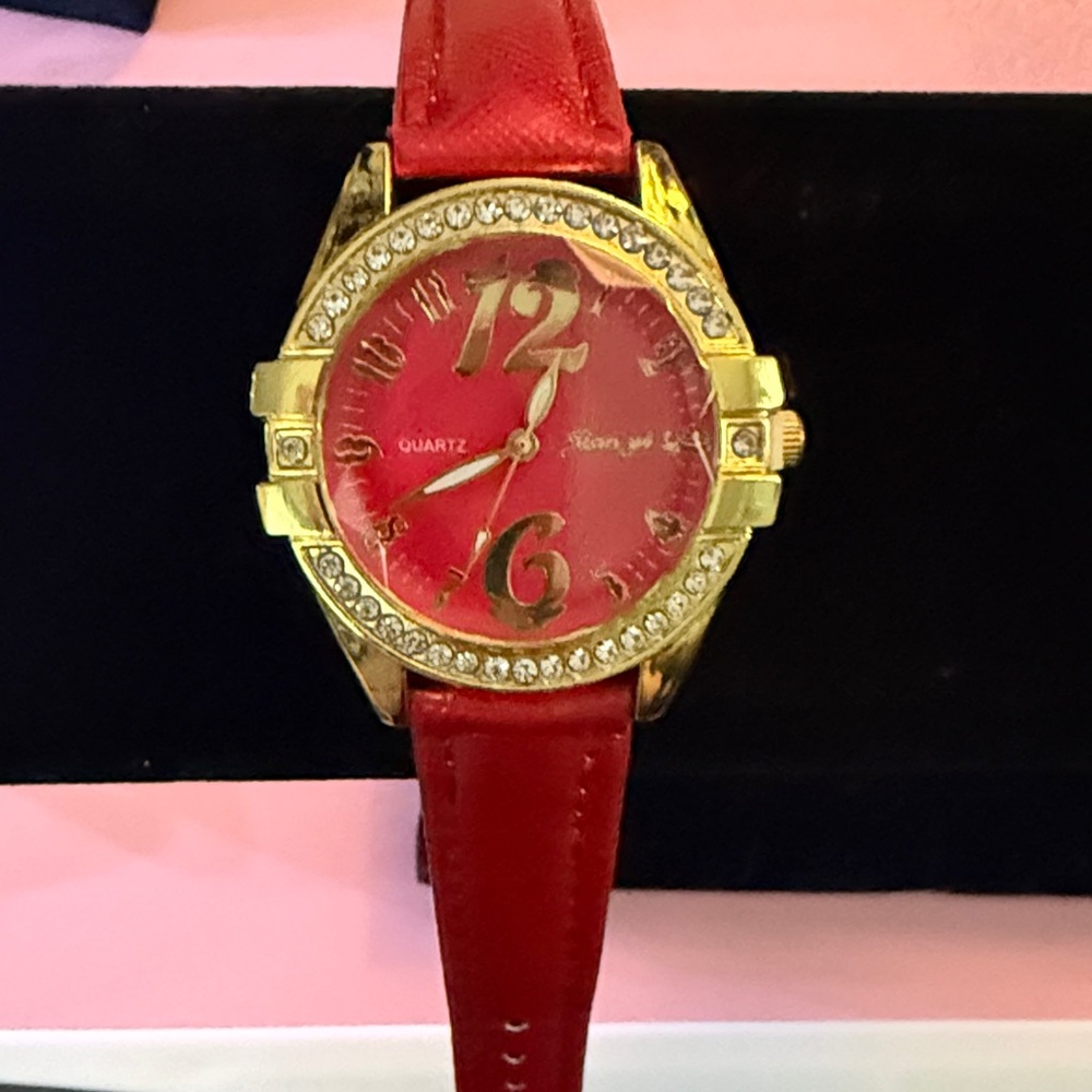 Beautiful red watch with gold and cz’s